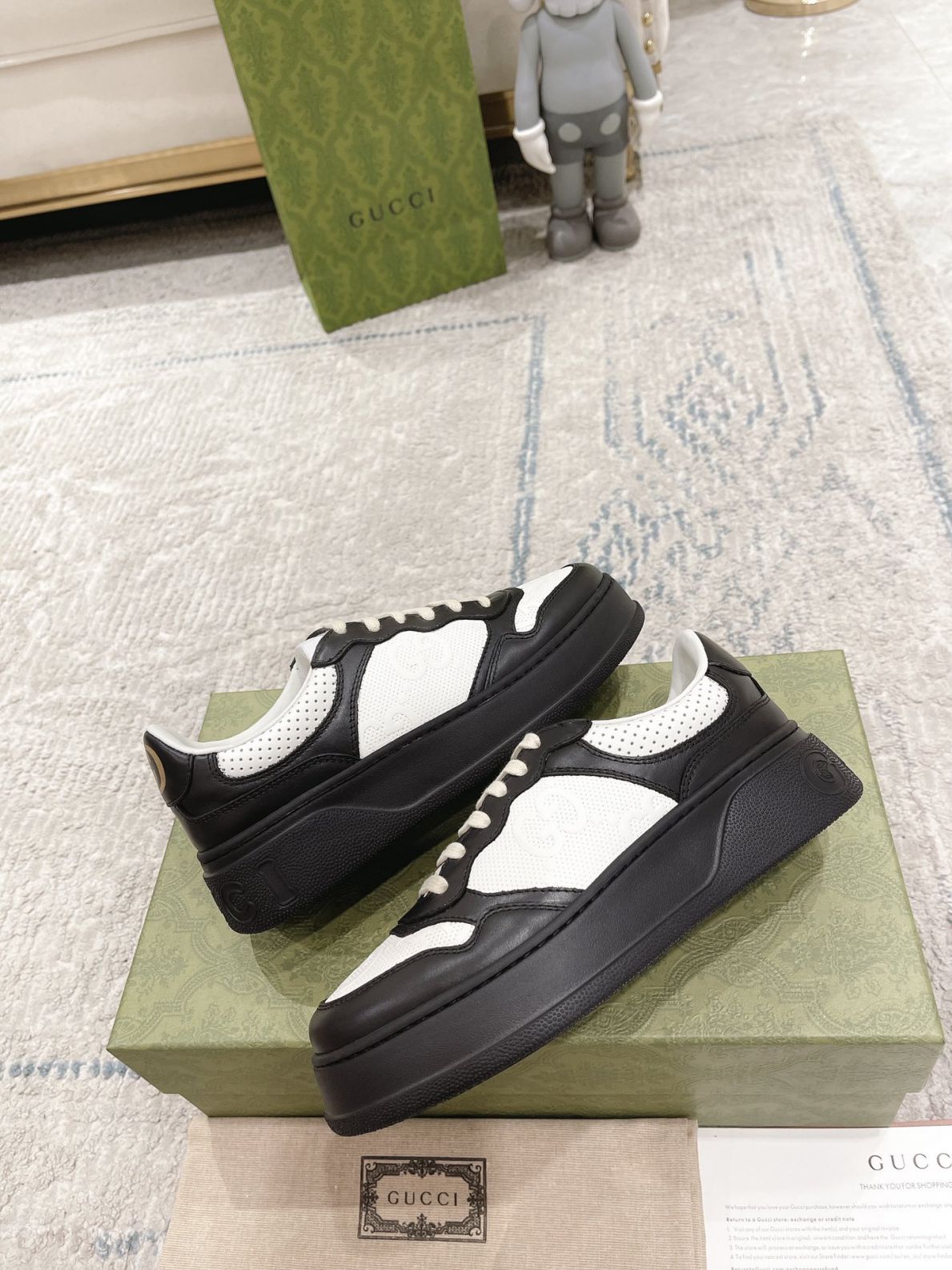 Giày Gucci GG Sneaker Black White leather họa tiết GG dập nổi Like Auth